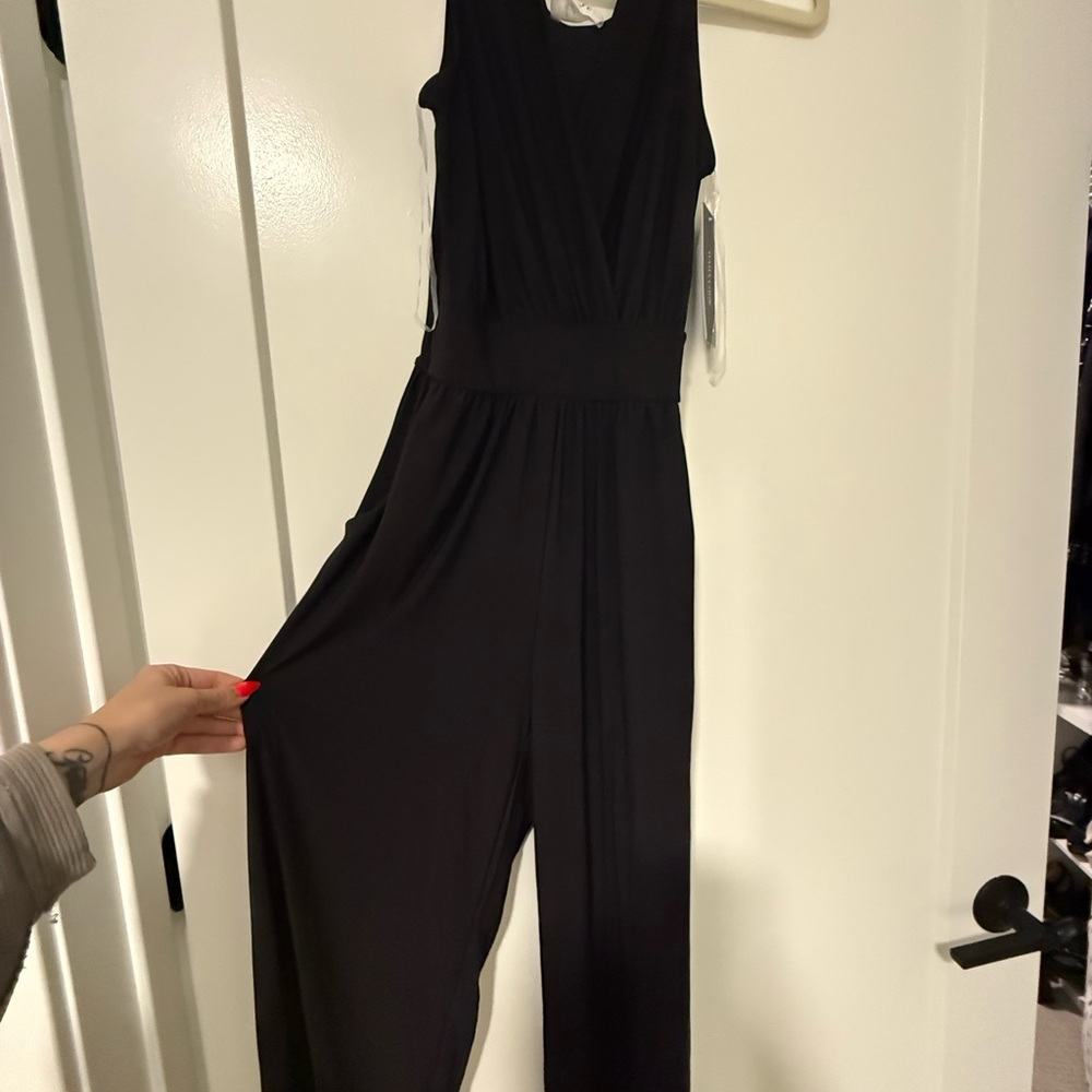 Black full length romper XS Korye